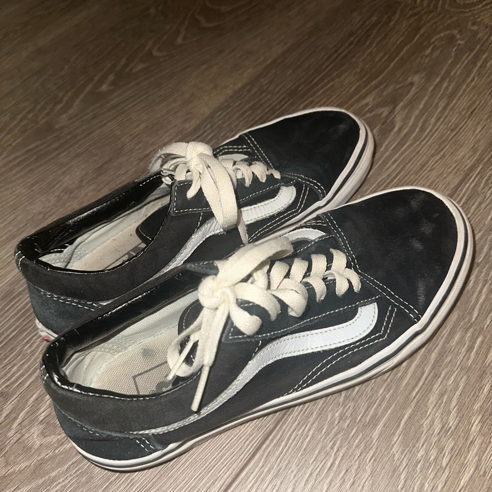 Vans Classic Black and White Slip-Ons